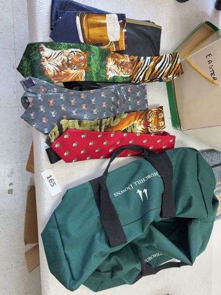 Ties, men's hat, scarves, duffel bag, rug image