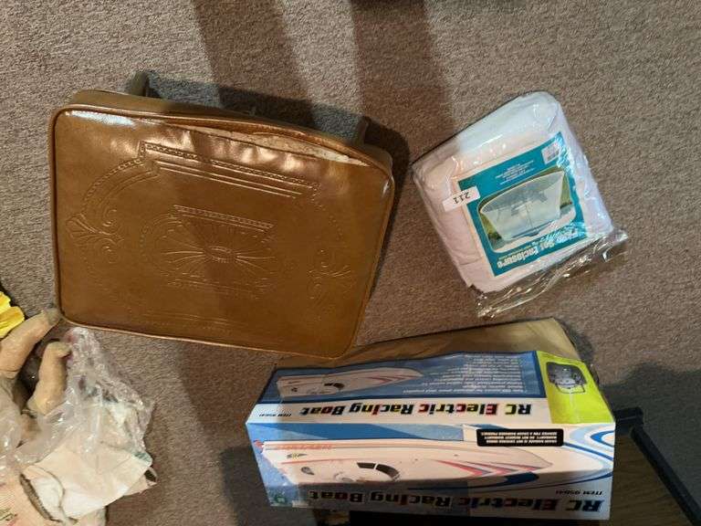 Patio set enclosure, RC electric boat, foot stool image