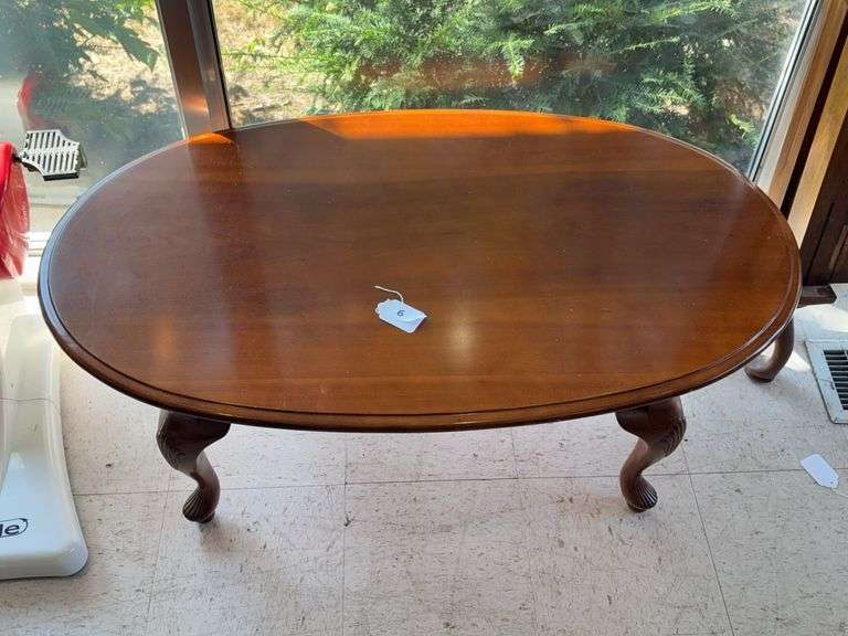Oval coffee table w/ pressed legs image