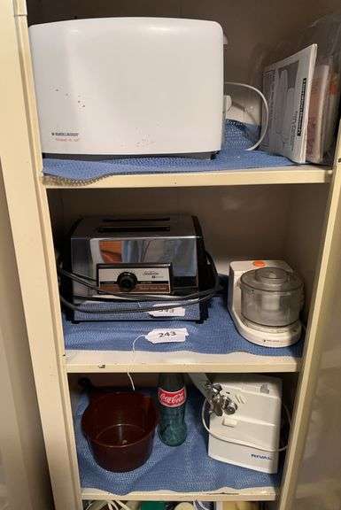 2 toasters, 2 hand mixers, electric can opener, Black and Decker chopper image