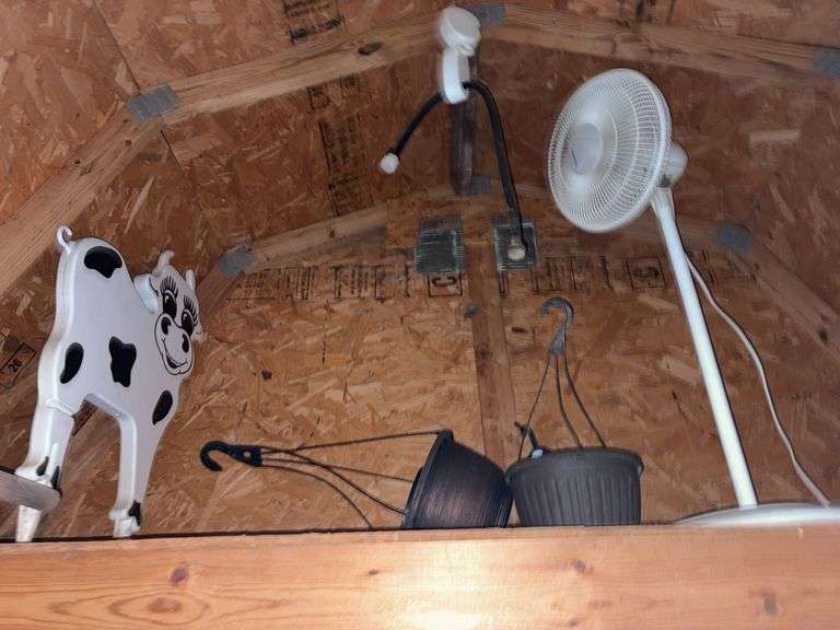 Floor fan , cow cut out, plastic pots image