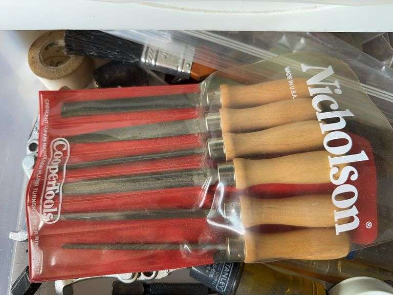 Storage tote with contents and 2 baskets image