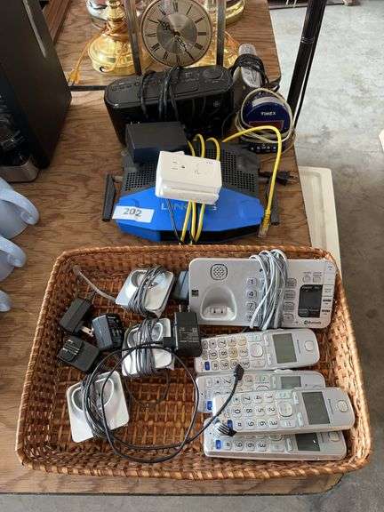 Panasonic Phones, Wifi Router, Alarm Clocks, Bulova Mantle clock image