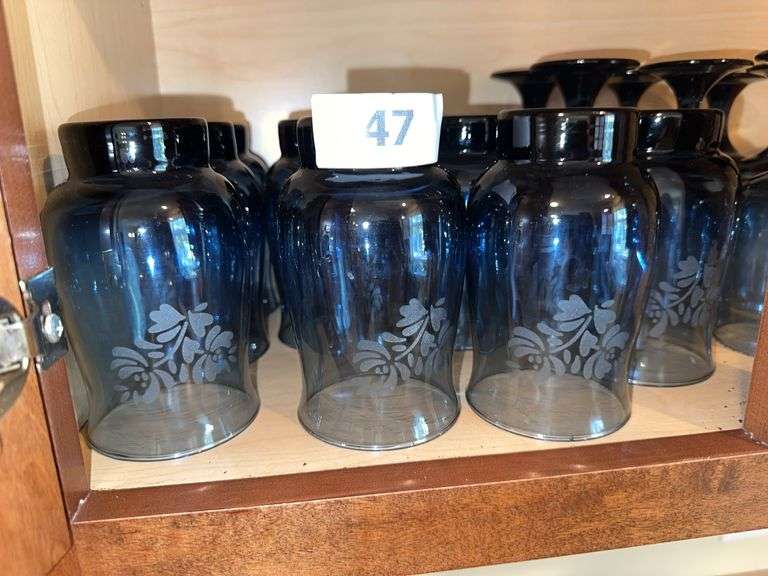 Blue etched glass tumblers, and stemmed glasses