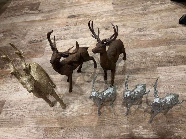 Plastic glitter deer and two resin deer image