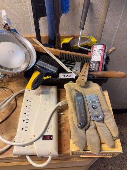 Paint supplies, power strip, light, gloves, misc image