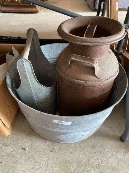 Galvanized wash tub, milk can, handled flower vase image