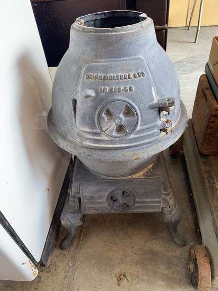 Vintage Sears Roebuck & Co No. 119-59 cast iron pot belly stove 28” high image