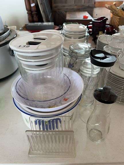 Canister Trio, Clear glass and plastic jars/canisters, plastic bowls and ceramic pot with lid image