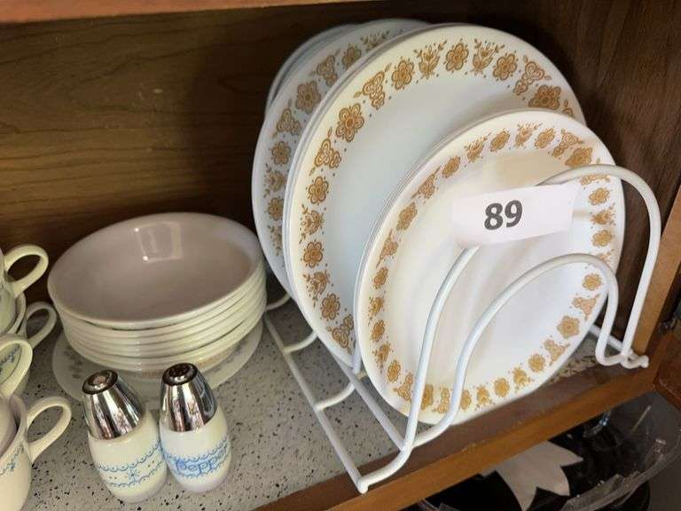 Contents of bottom shelf on right image