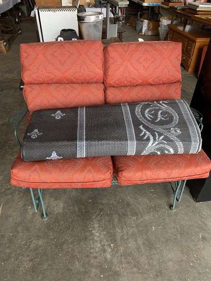 Metal Patio Glider with cushions and patio rug image