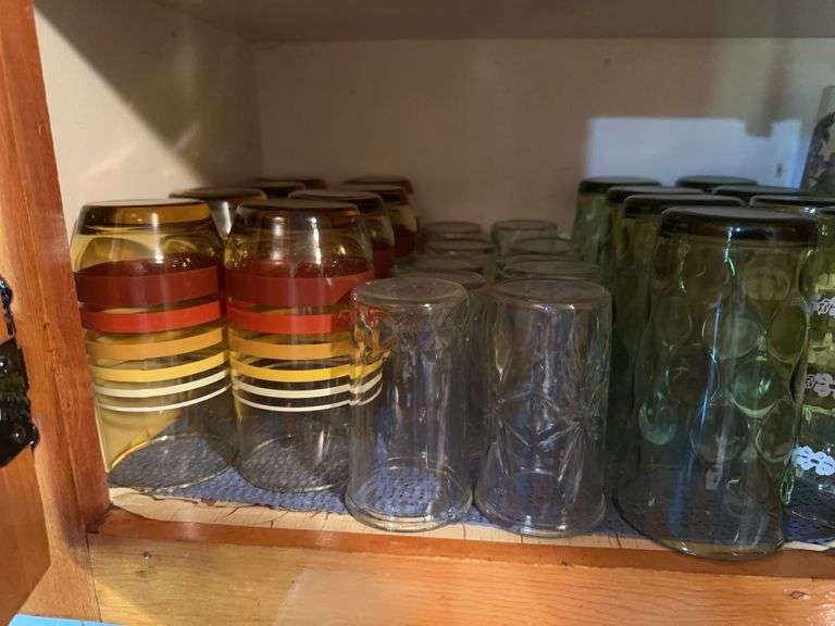 Lot of misc glasses including 3 Coca Cola glasses, soup bowls, coffee mugs image