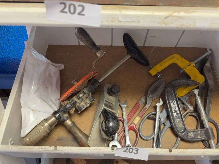 Drill, tin snips, block plane, clamps image