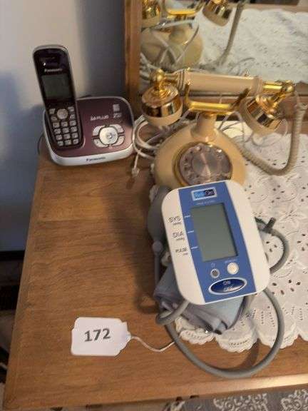 Cordless phone. Vintage style phone, blood pressure machine image