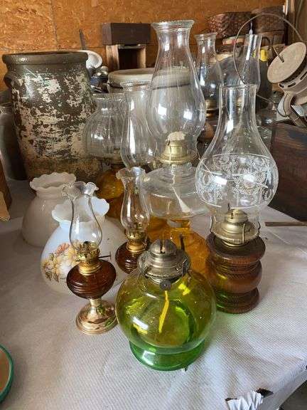 7 oil lamps, 2 glass shades image