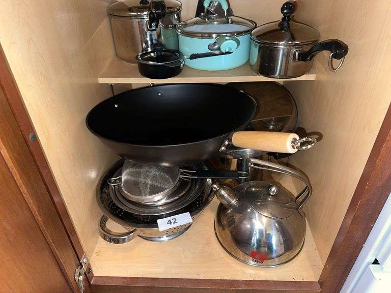 Pots, pans, tea pot, strainer, wok