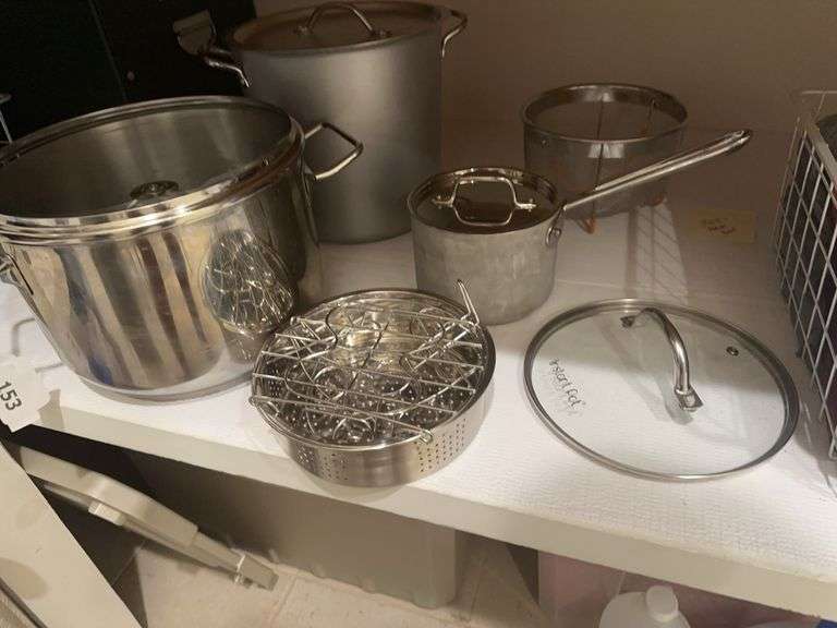 2 stock pots, strainer, sauce pan with lid image