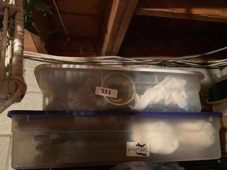 2 tubs candle sticks and miscellaneous image