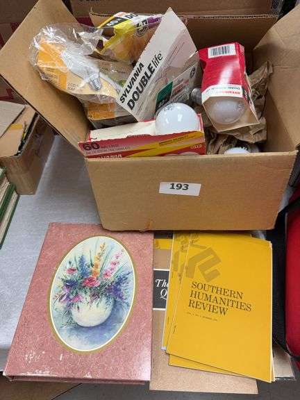 Lightbulbs, vintage newspaper article, photo album image