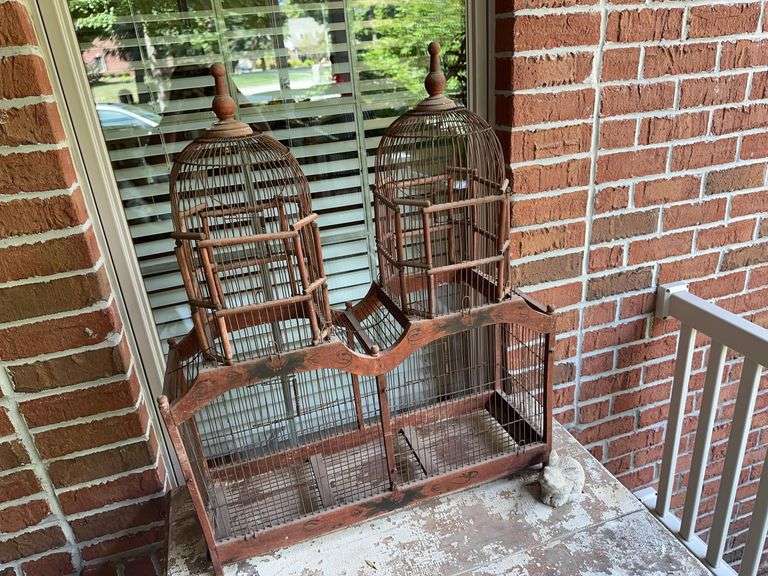 Wooden birdcage, small concrete bunny image
