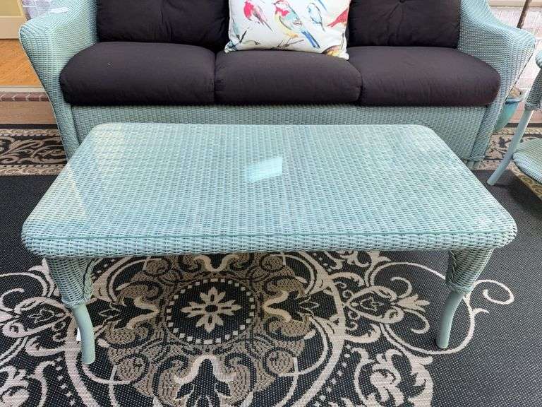 Like-new, Lloyd & Flanders "Reflections" all-weather, wicker coffee table with glass image
