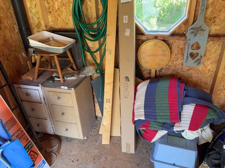 2 storage cabinets & contents, hose, plastic pet crate, blanket, thermometer image