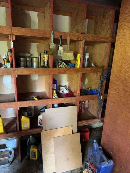 Contents of closet, trash can, plastic gas can image