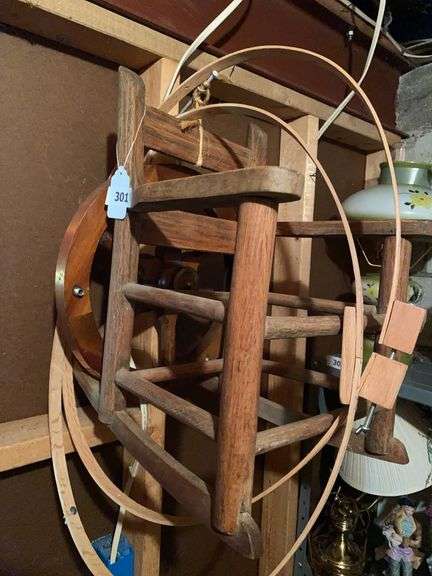 Vintage child’s rocking chair, wheel, frame image