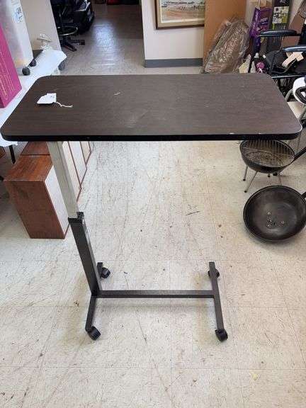 Adjustable bed side table image