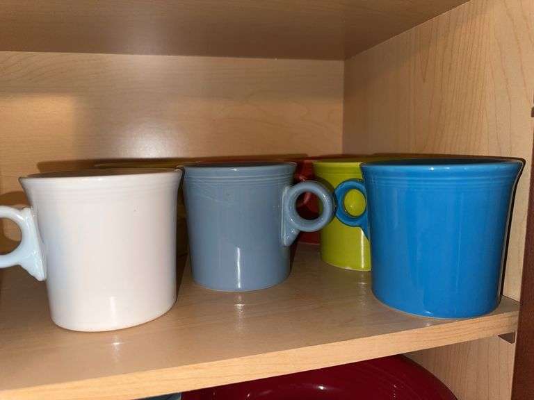 7 Fiesta mugs, 4 Fiesta glass tumblers and 3 juice glasses image