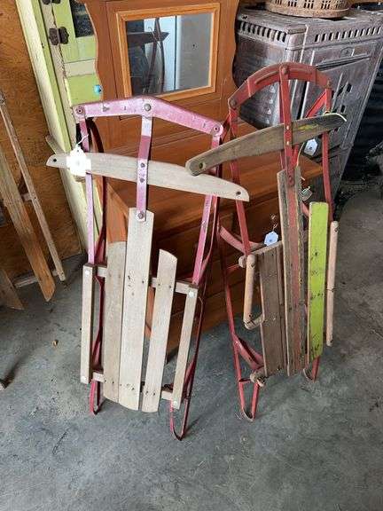 Two vintage sleds 43” and 45” long image