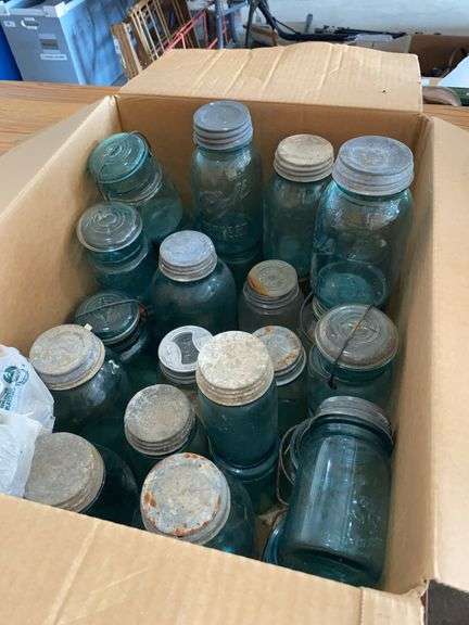Mostly blue ball canning jars with zinc lids image