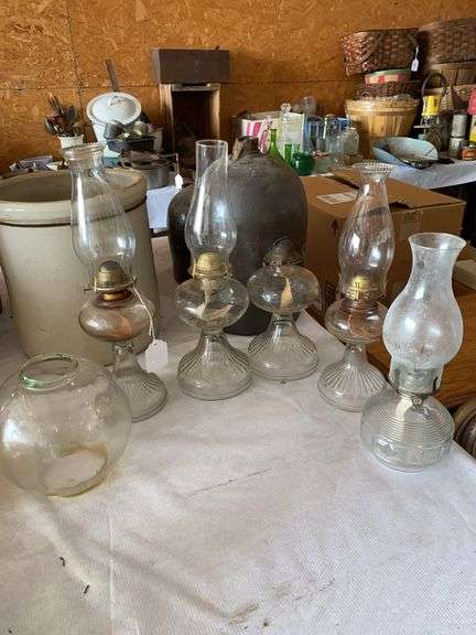 5 oil lamps, 1 light globe image