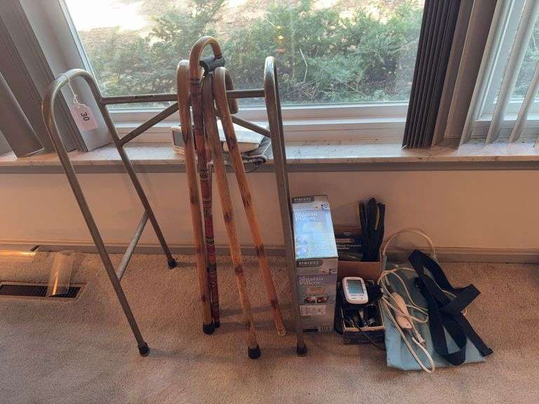 Canes, walker, heating pad, blood pressure monitor, shiatsu pillow, misc