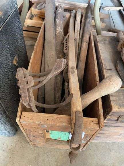 Vintage items, plow head, horse hames, hand auger, metal single trees, miscellaneous image