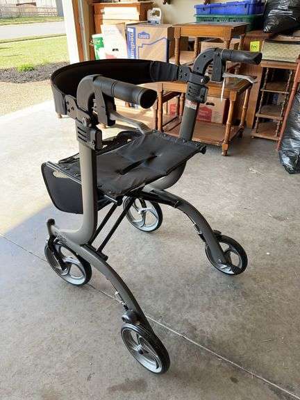 Folding walker/seat with hand brakes image