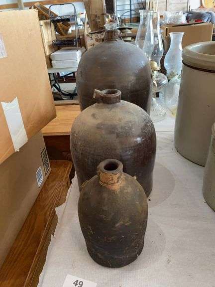 3 jugs all with broken handles image