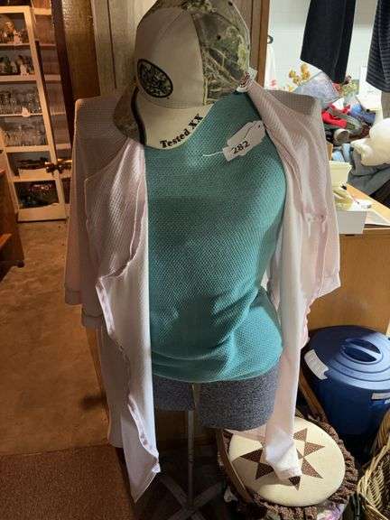 Female dress form  and basket with fabric, yarn , etc image