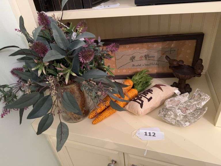 Cast-iron birdbath, artificial floral, framed needlework, pottery bird image