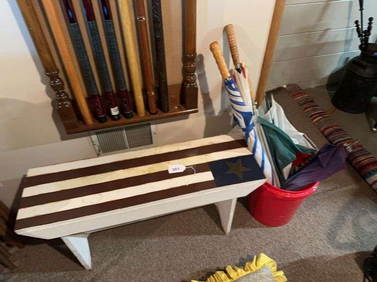 American flag bench, lot of umbrellas image