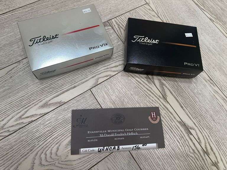 $156.00 Gift Card for golf at any Evansville Municipal Golf Courses, box of Titleist Pro V1x golf balls, box of Titleist Pro V1 golf balls image