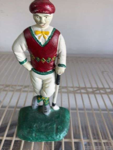 Cast iron golfer door stop image