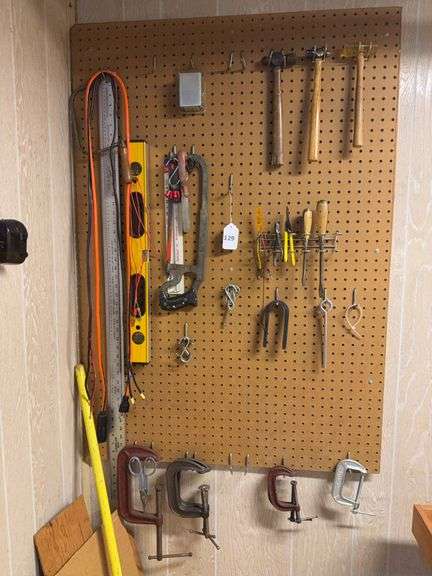 Misc tools: C clamps, level, saw, hammers, metal ruler image