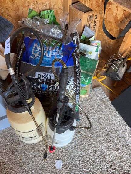 2 garden sprayers, 2 bags of mulch, seed & fertilzer, light image