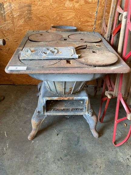Antique cast iron stove #490 image