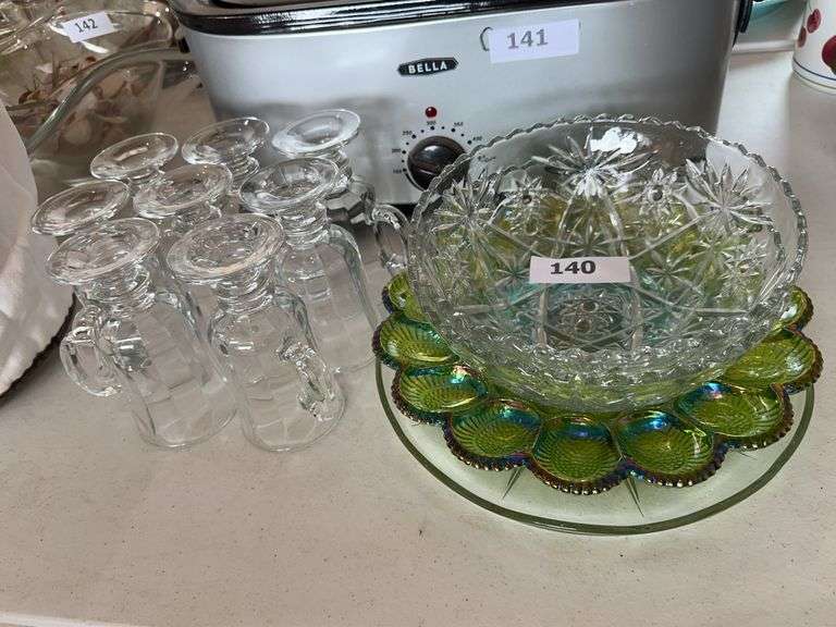 Carnival Glass egg dish, clear glass bowls, platter and 8 handled glass mugs image