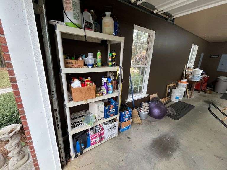 Contents Wall to Wall Left Side of Garage - Plastic Shelves & Contents, Pool Chemicals, Red Toolbox, Table & Contents image