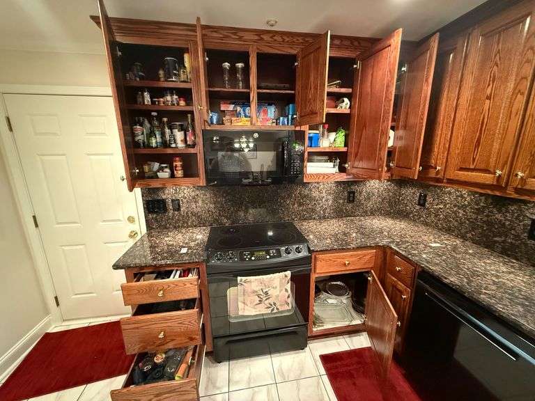 Contents of Top & Bottom Range Cabinets - Misc. Silverware, Bowls, Casserole Dishes image