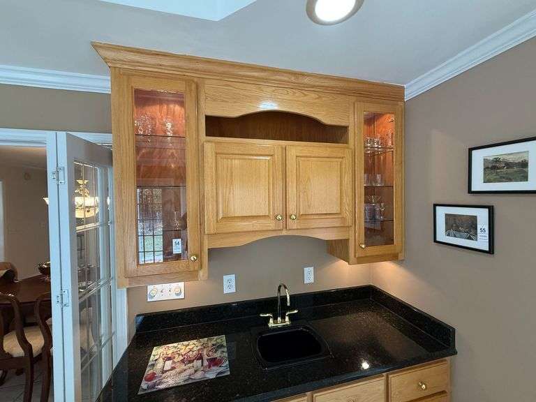 Contents of Cabinet over Bar - Misc. Cocktail Glasses, Shot Glasses, Wine Glasses image