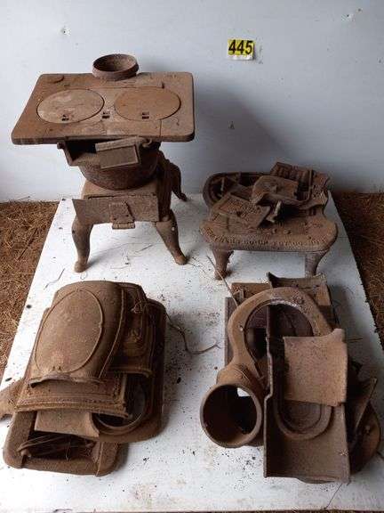 Four Antique Wood Burning Stoves image